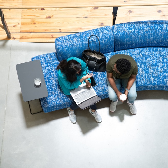 students sitting on a couch